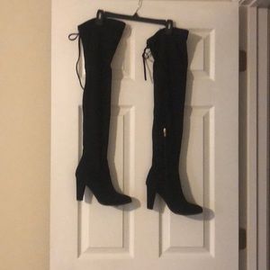 Black suede thigh-high boots
